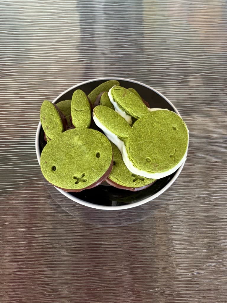 Miffy-shaped matcha chocolate sandwich cookies in a bowl